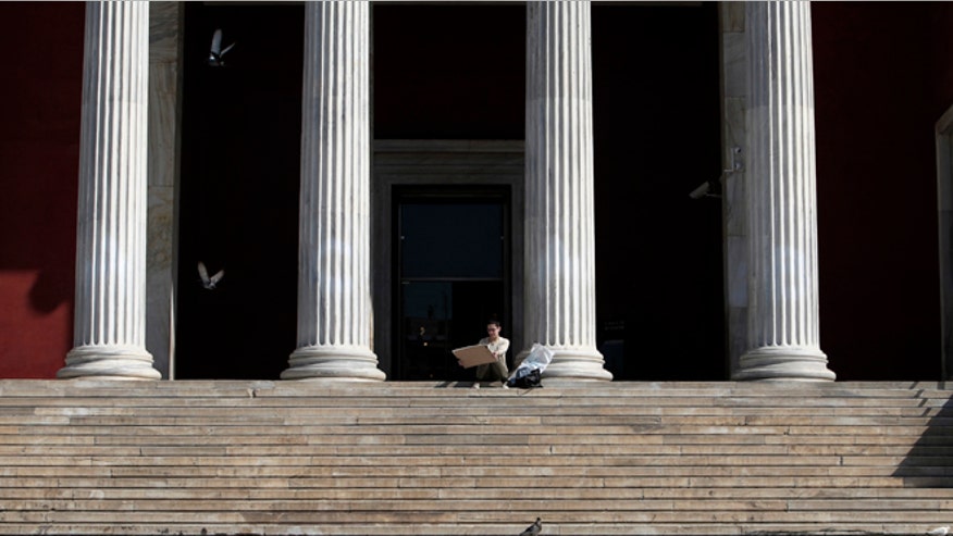 Student on steps of Greek capital.jpg